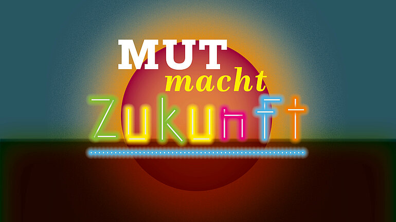 Eine aufgehende Sonne, davor die Schrift "Mut macht Zukunft"